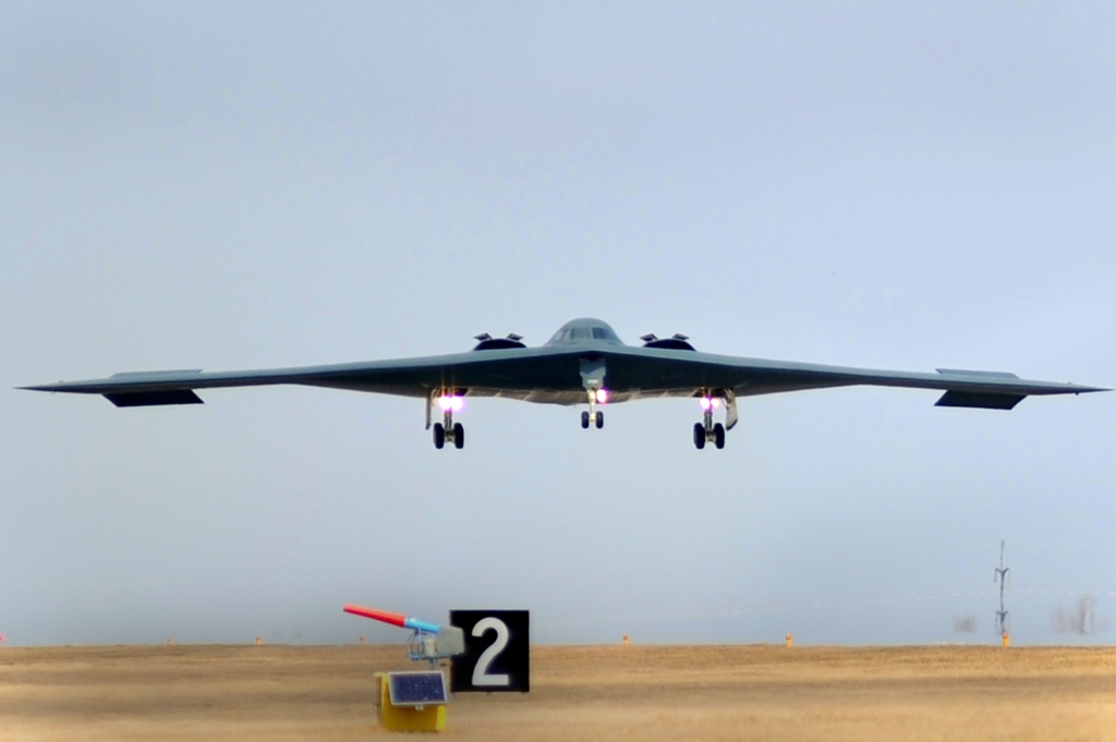 An American B-2 Spirit bomber lands at Whiteman Air Force Base after a bombing mission over Libya.